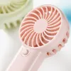 Colorful handheld mini fan, portable silent USB charging mini desktop fan Application Scenario
